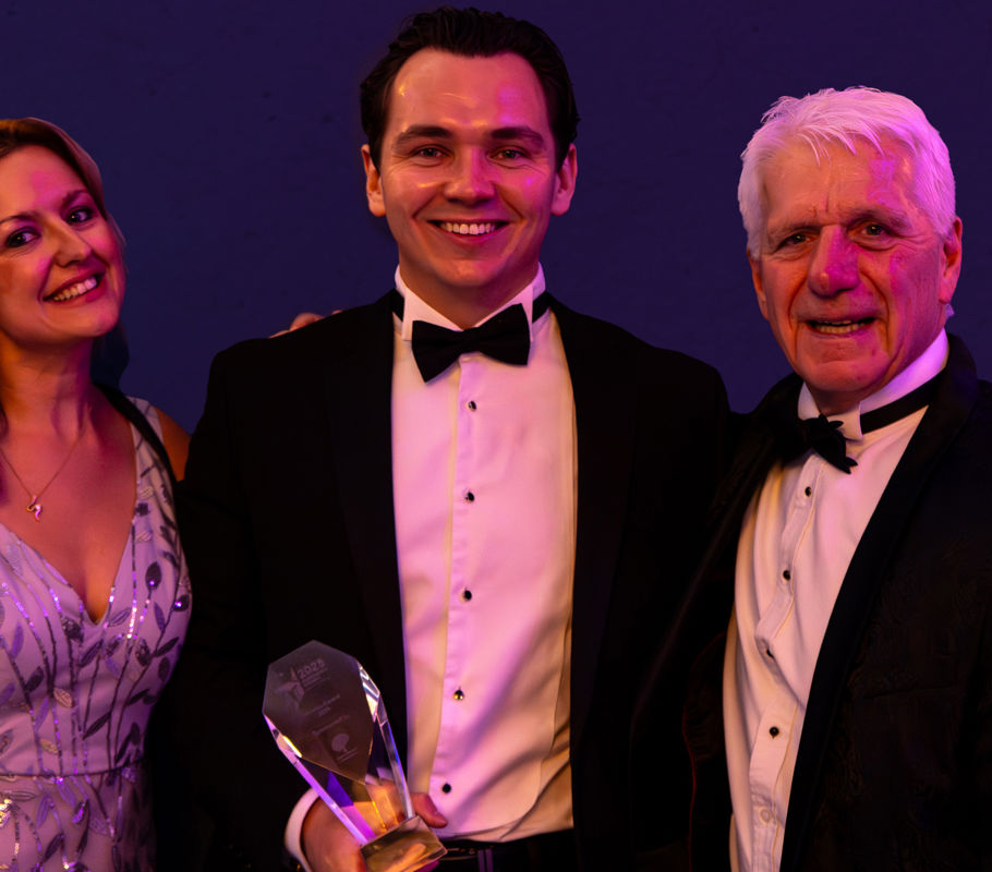 homecare franchise owners and leaders pose for award photograph