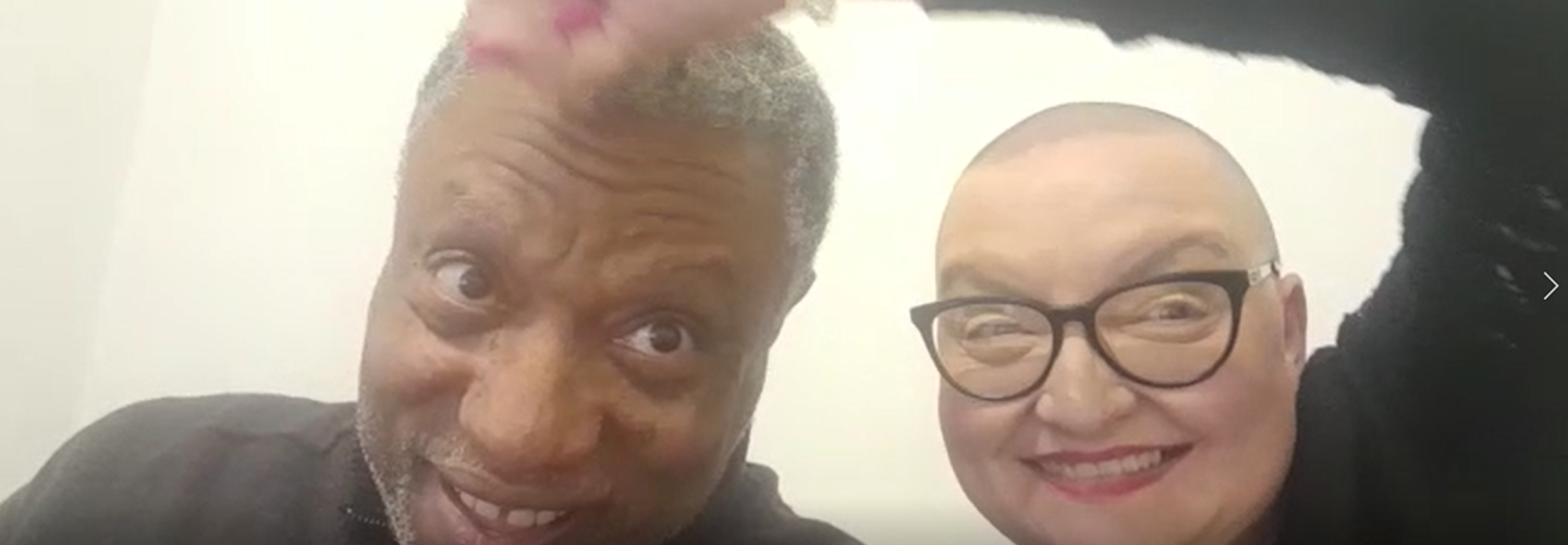 Tina with her already shaved head, pretends to shave Grantley's head still with his full head of hair