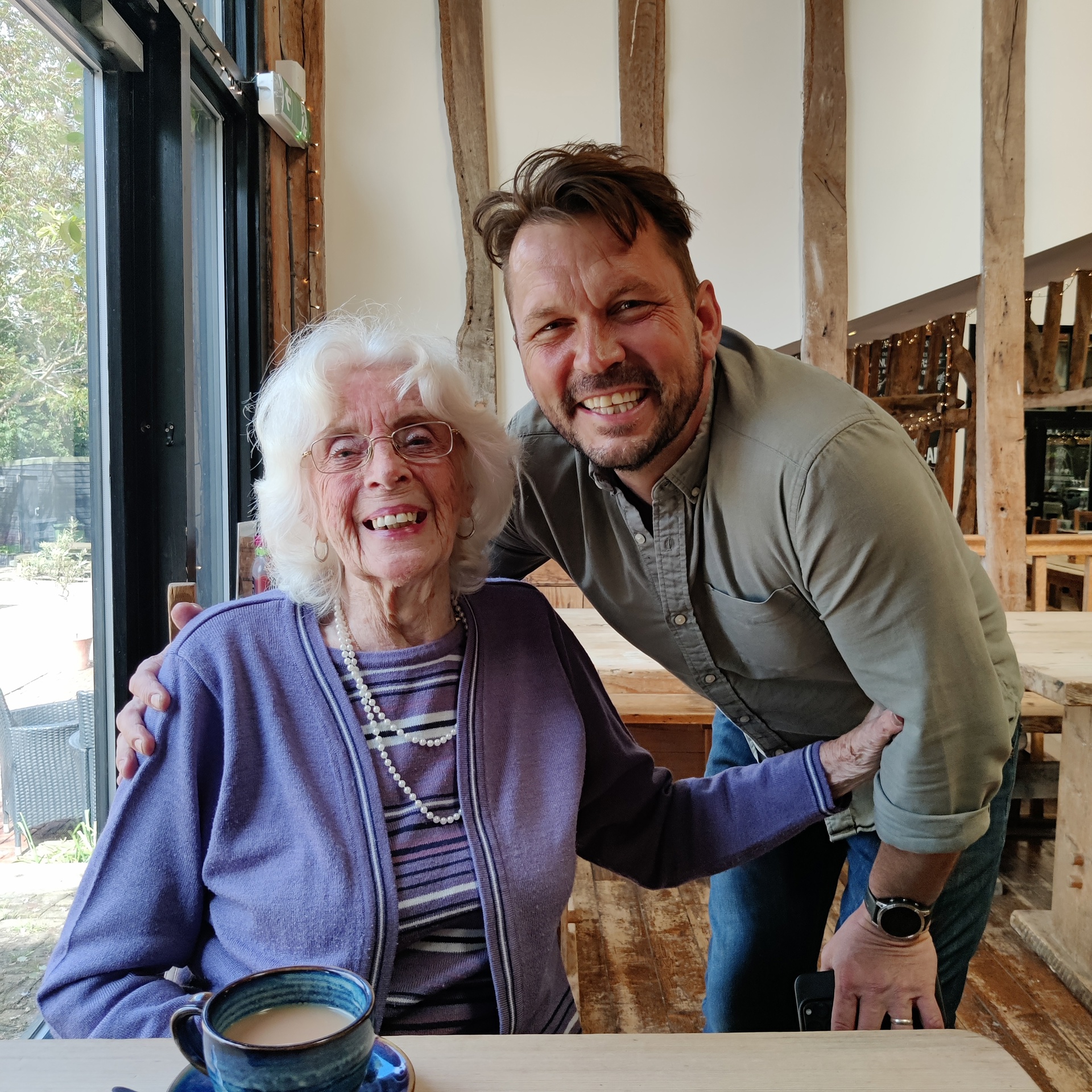 homecare client enjoying tea out and about at Jimmy's Farm in Rushmere St Andrew