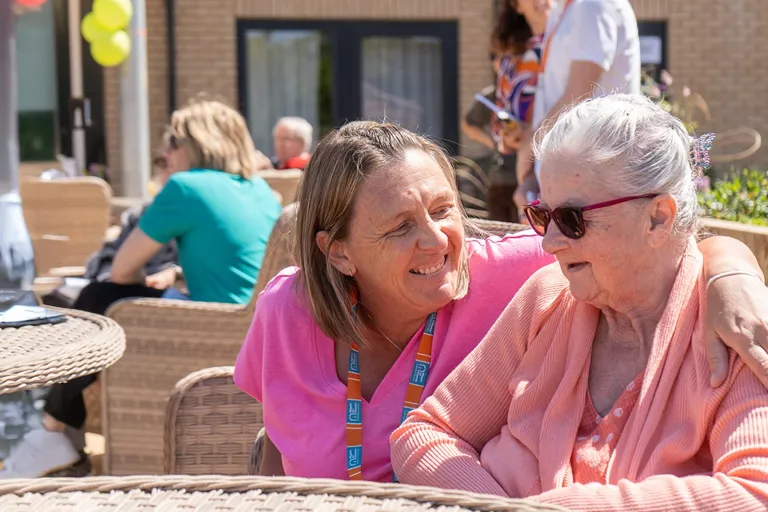 Our Client and Carer enjoying a day out at a local community event