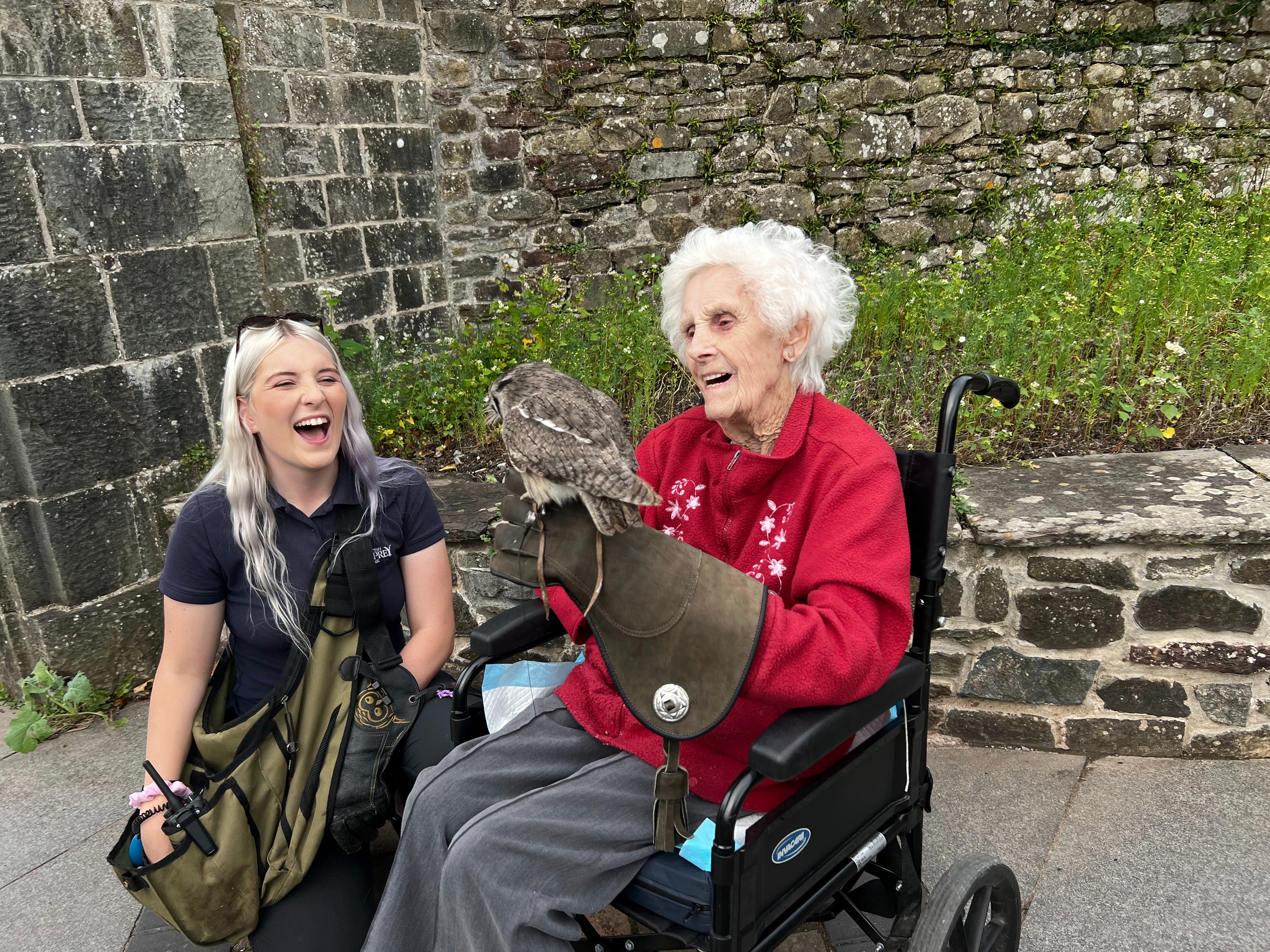 CareGiver with Client holding an Owl.