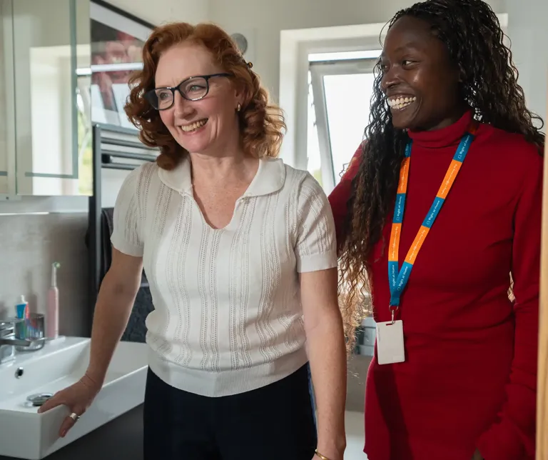 Carer providing personal care to Client 