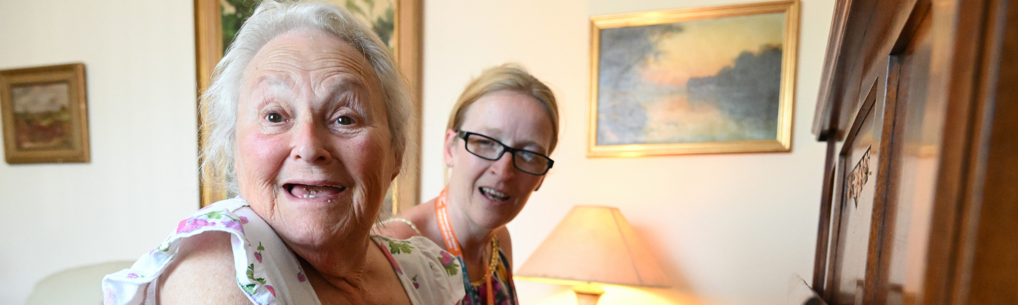 Respite_Care_Client_at_Home_with_CareGiver_Playing_Piano