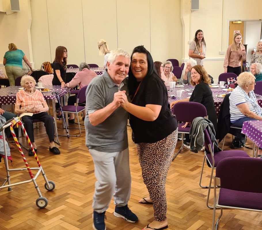 caregivers and clients enjoying community event