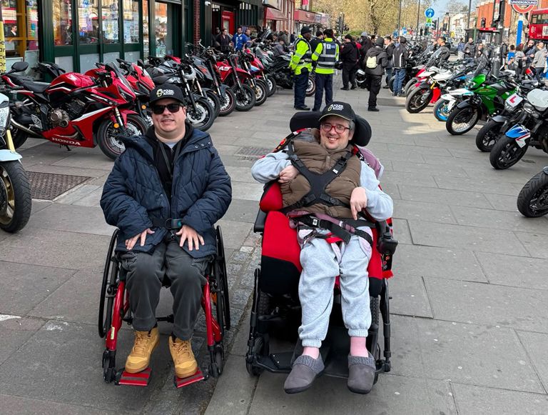 Our Client, Stewart, enjoying a day out with a friend and Carer