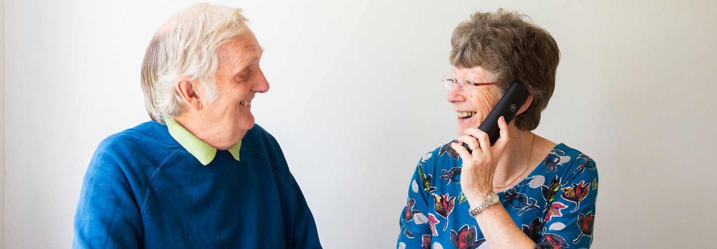 Two Clients smiling together