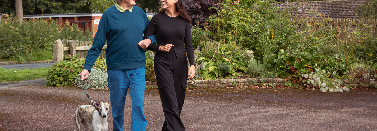 Client and CareGiver walking together