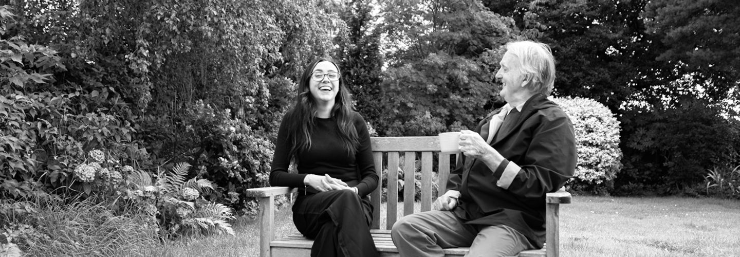CareGiver providing homecare and support to Client in garden
