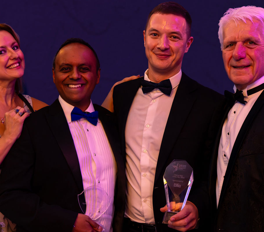 homecare franchise owners and leaders pose for award photograph