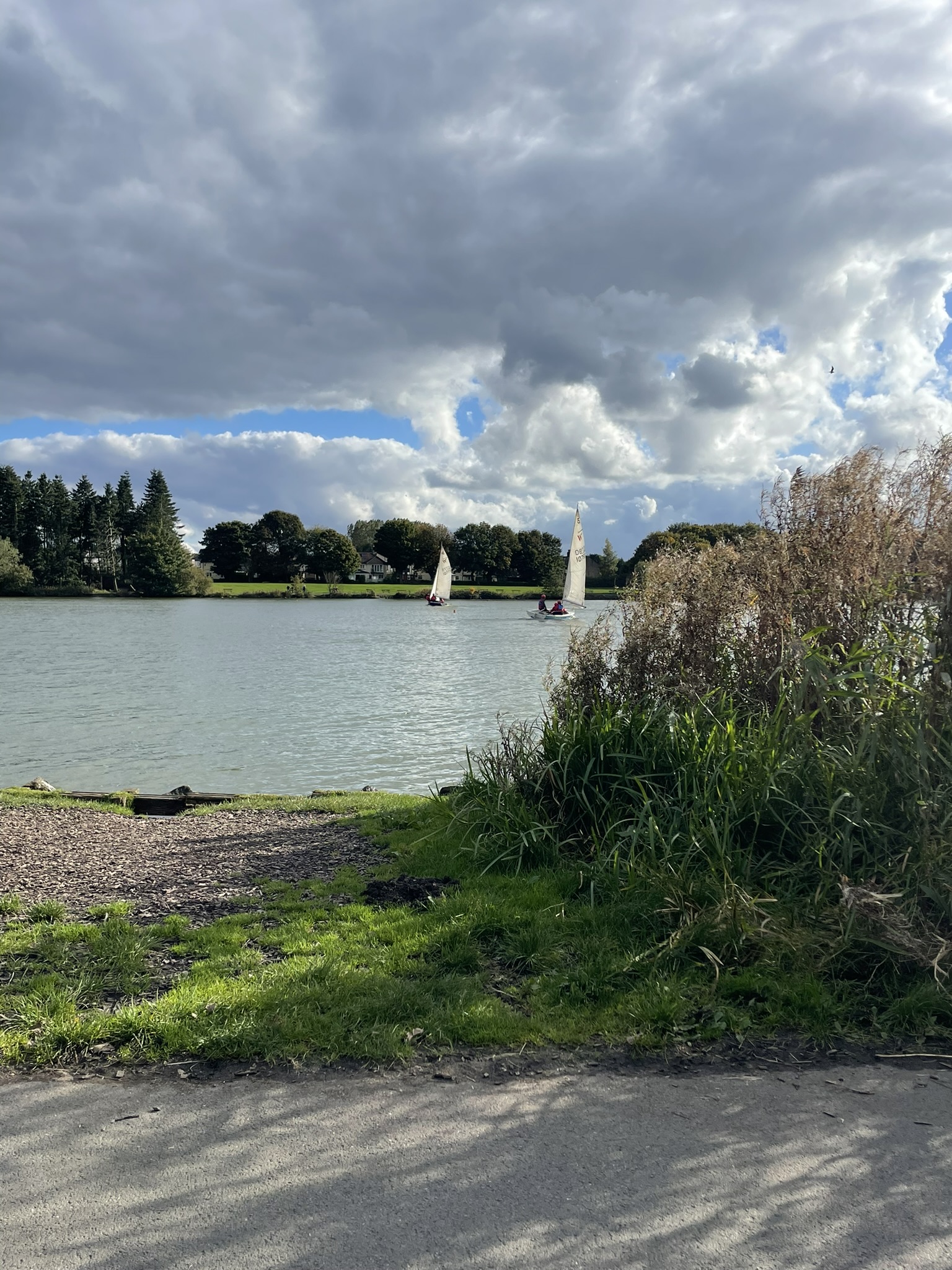 Sailing boats on Yeadon Tarn in Leeds, photographed during the Right at Home North Leeds, Otley & Horsforth Walk for Hearts challenge.