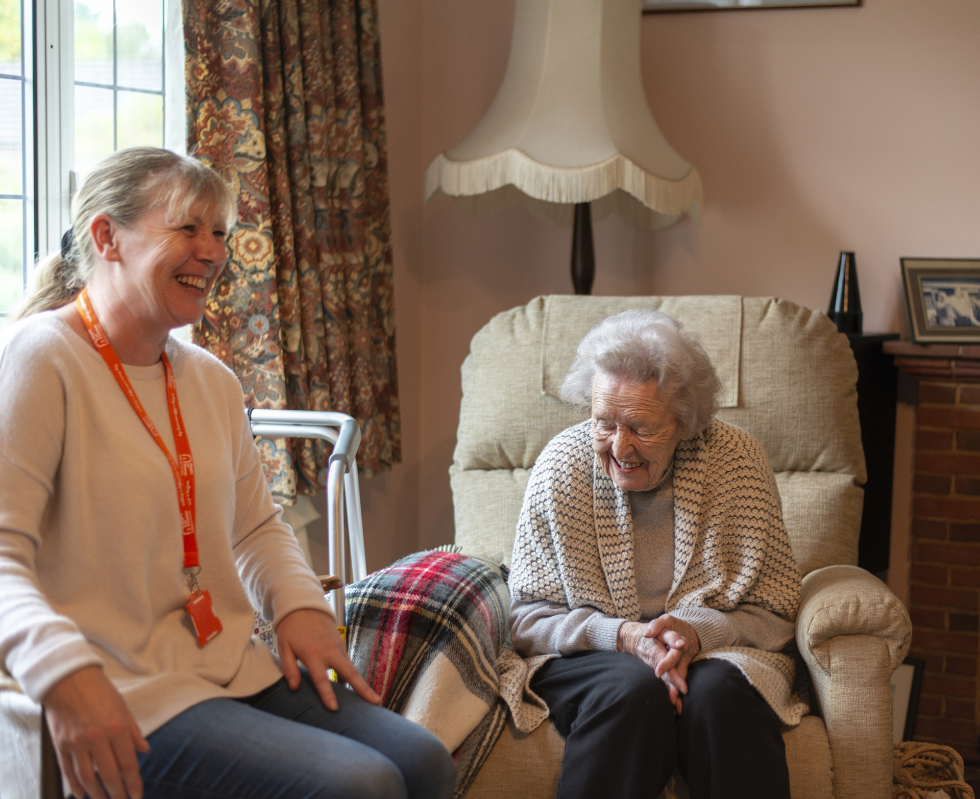 CareGiver and client sitting indoors