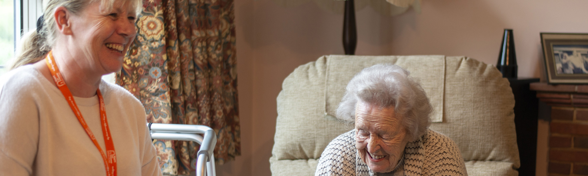 CareGiver and client sitting indoors