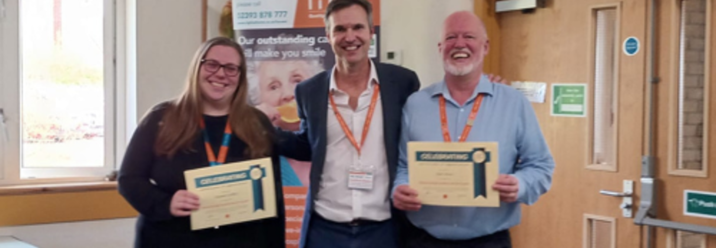 Becky and Mark receive their 8 years service certificates from Owner/Director, Duncan Cameron.