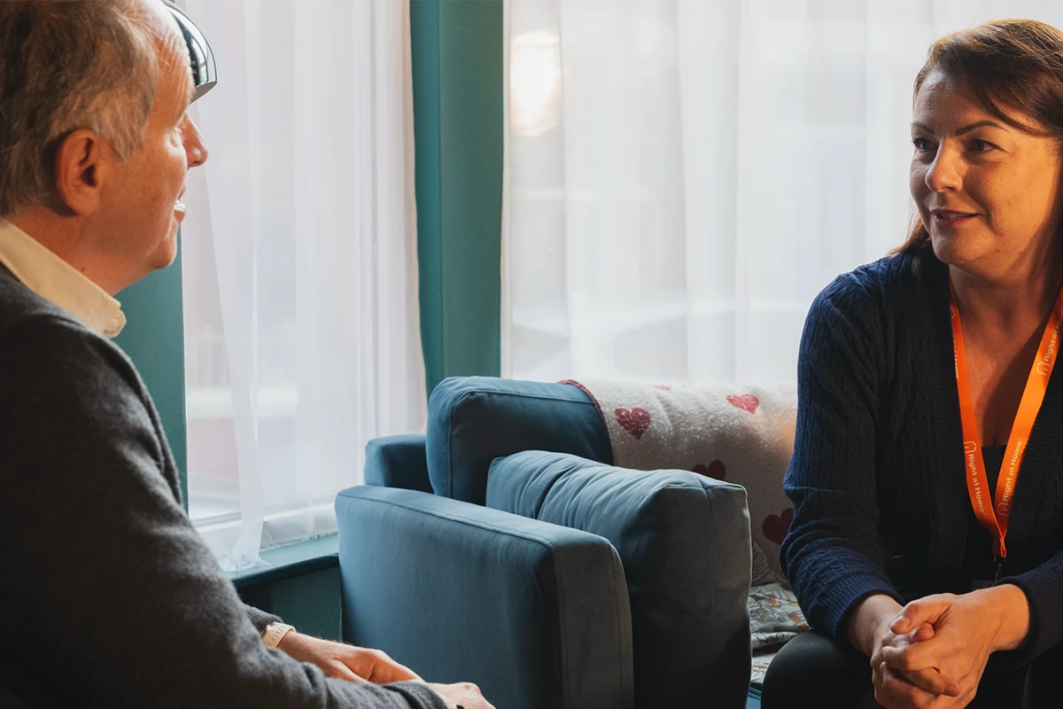 Client and Registered Manager discussing bespoke care plan