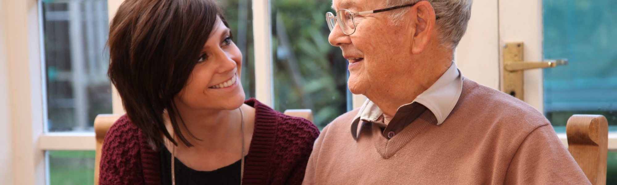woman providing homecare companionship to male client