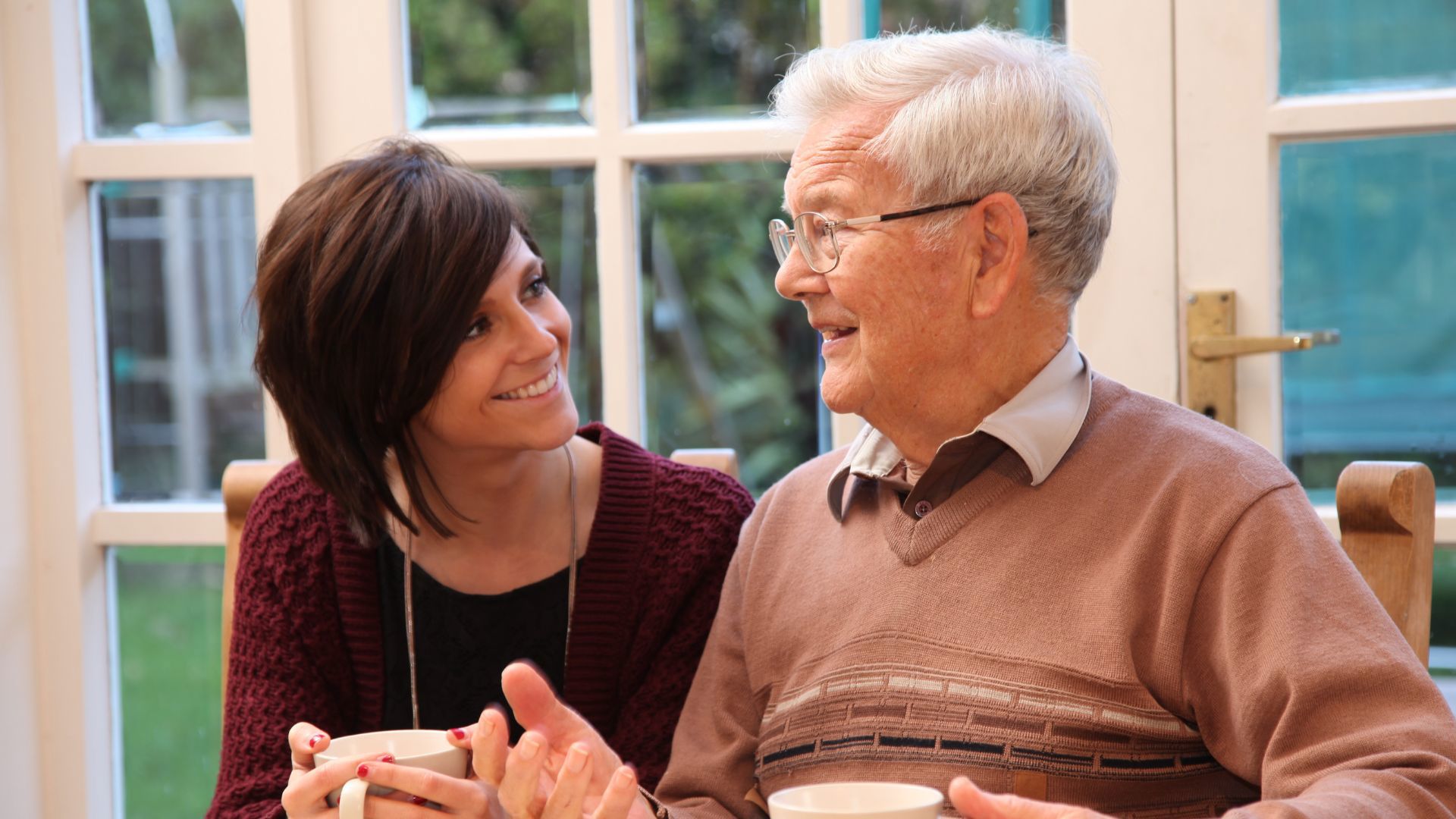 woman providing homecare companionship to male client