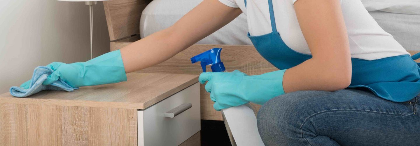 Person cleaning room