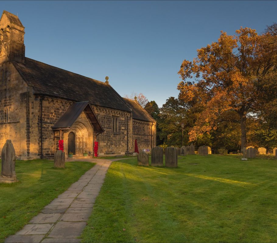 st john the baptist church lawn and headstones in adel