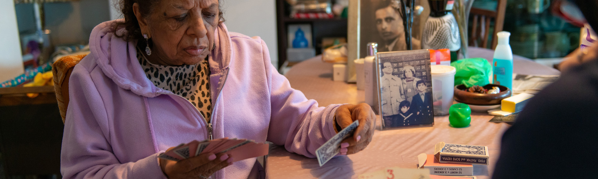 Client and CareGiver playing cards