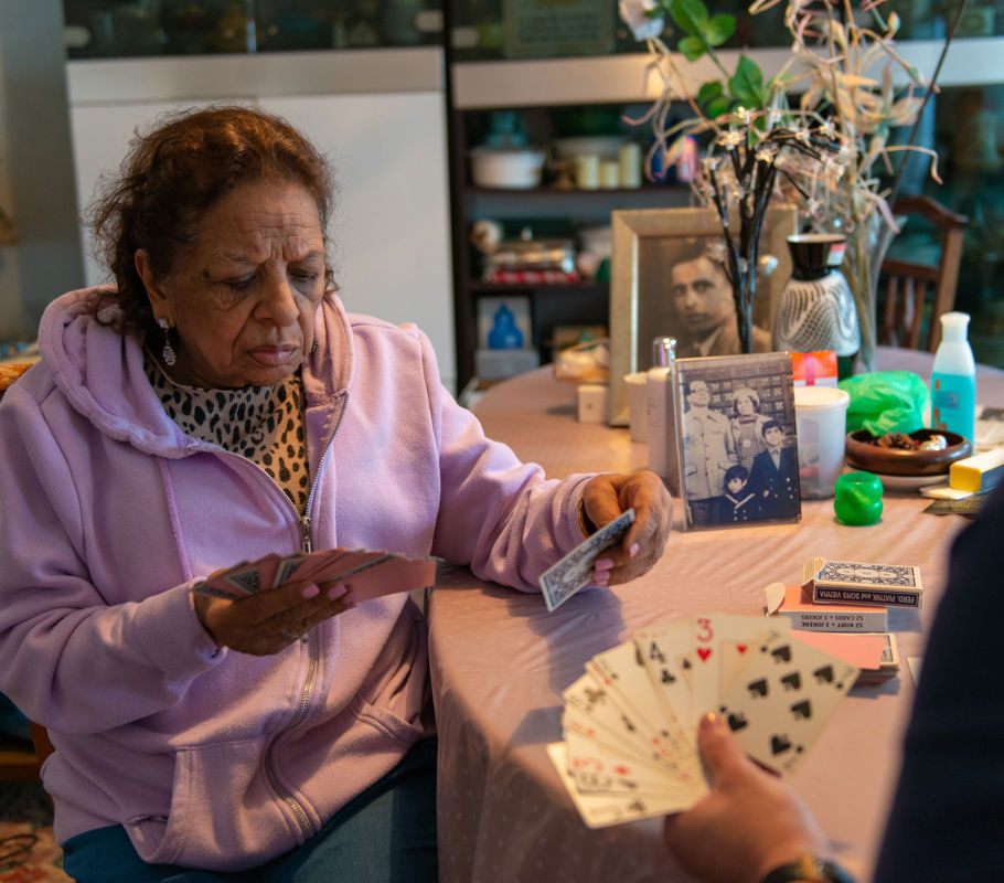 Client and CareGiver playing cards