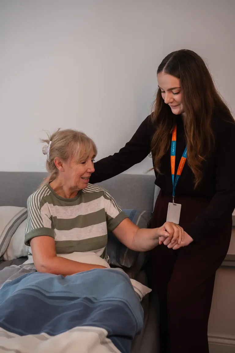 Carer supporting Client to get ready for the day