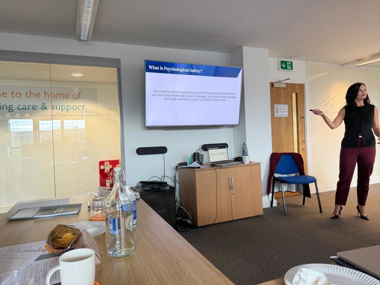Person presenting slide on psychological safety