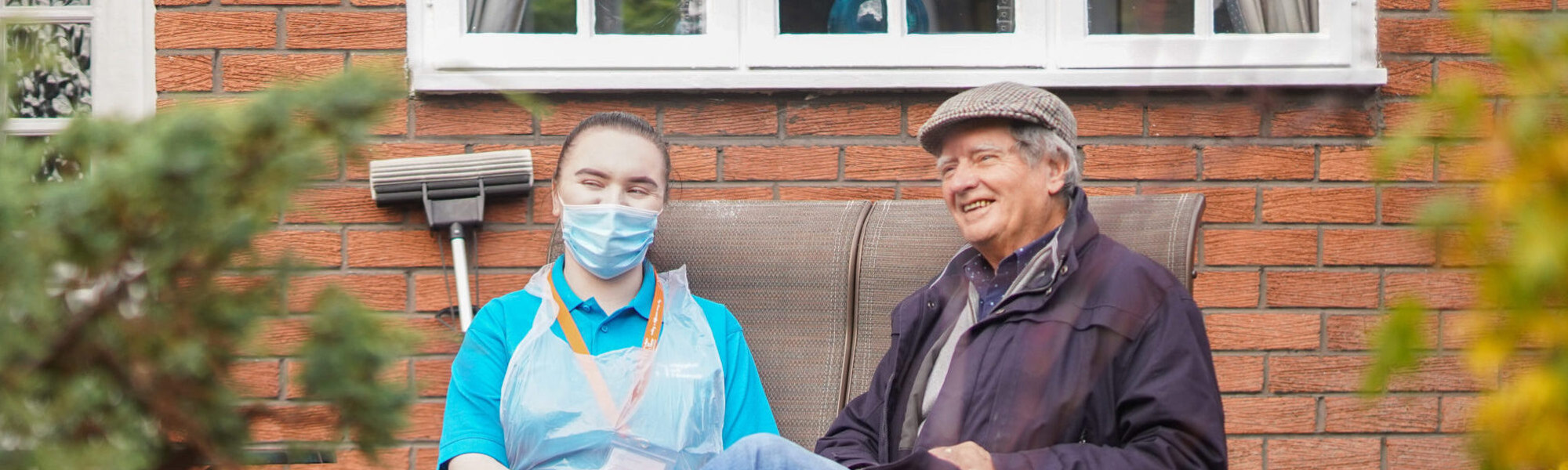 Client and CareGiver in the garden