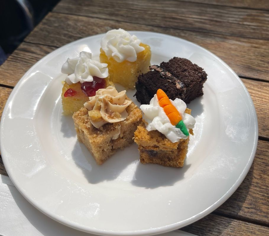 assortment of cakes on plate in Dorking