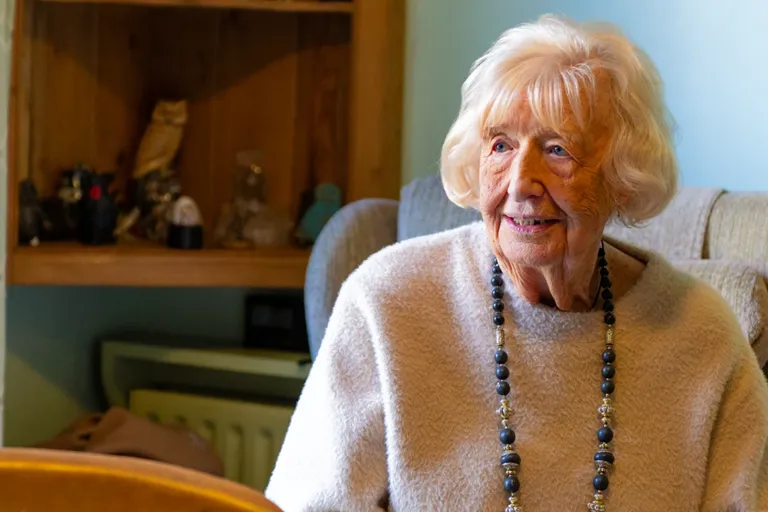 Older client living well at home in familiar surroundings