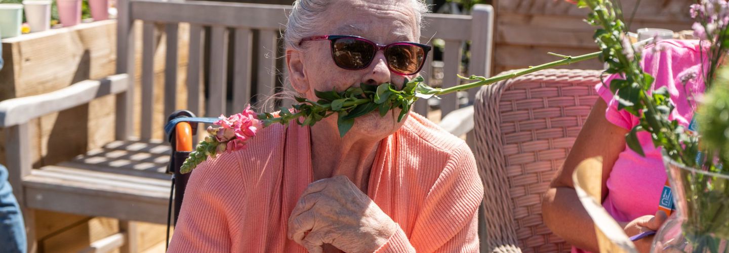 client in garden enjoying big green picnic