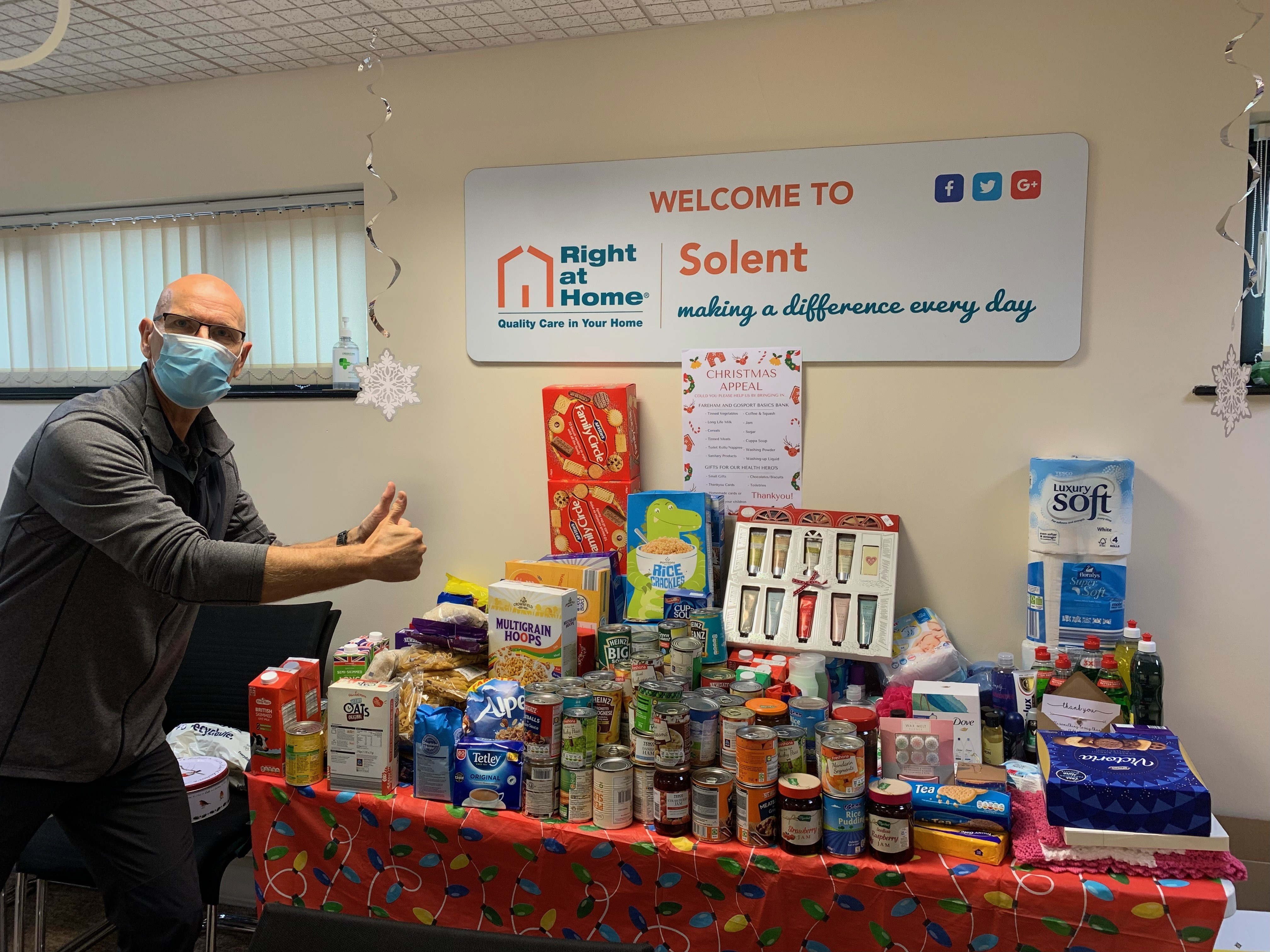 Man with food donations for Charity