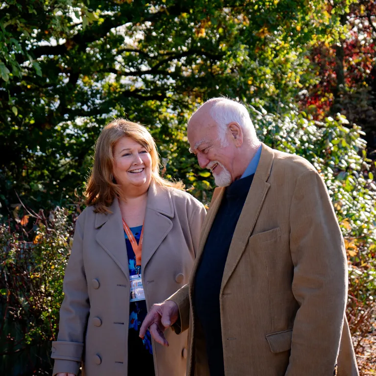 Client and Carer having a walk in the local park