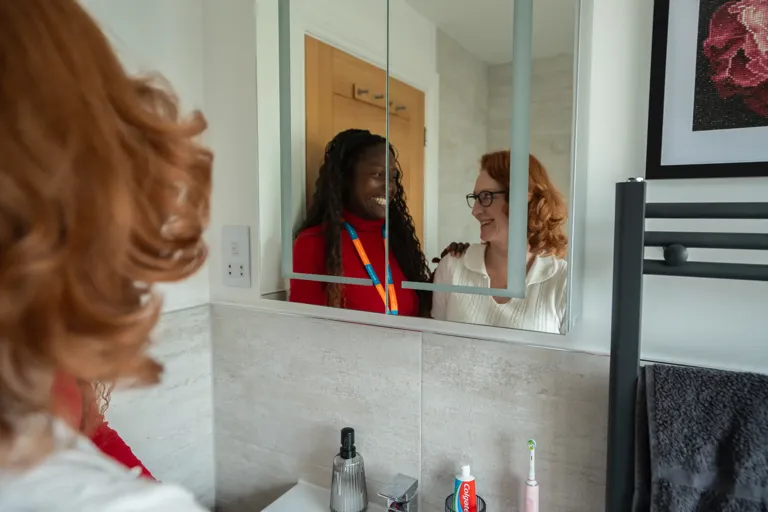 Client and Carer in bathroom 