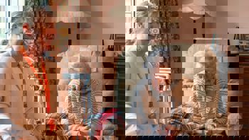 Elderly Client and Carer laughing together