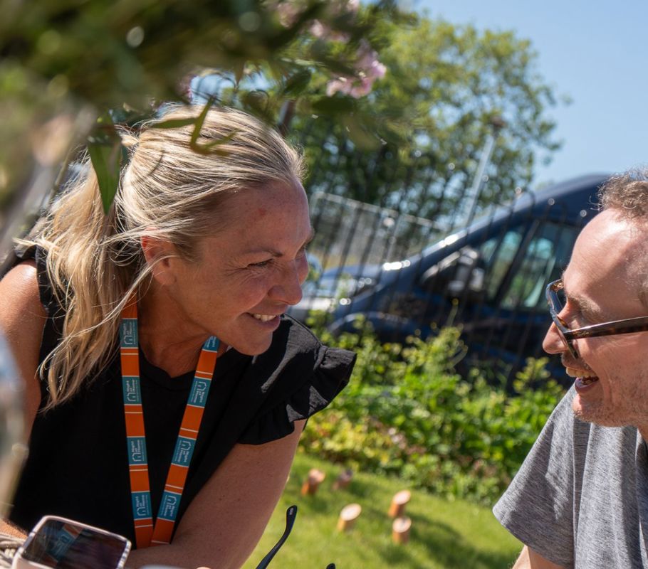 client and carer enjoying picnic
