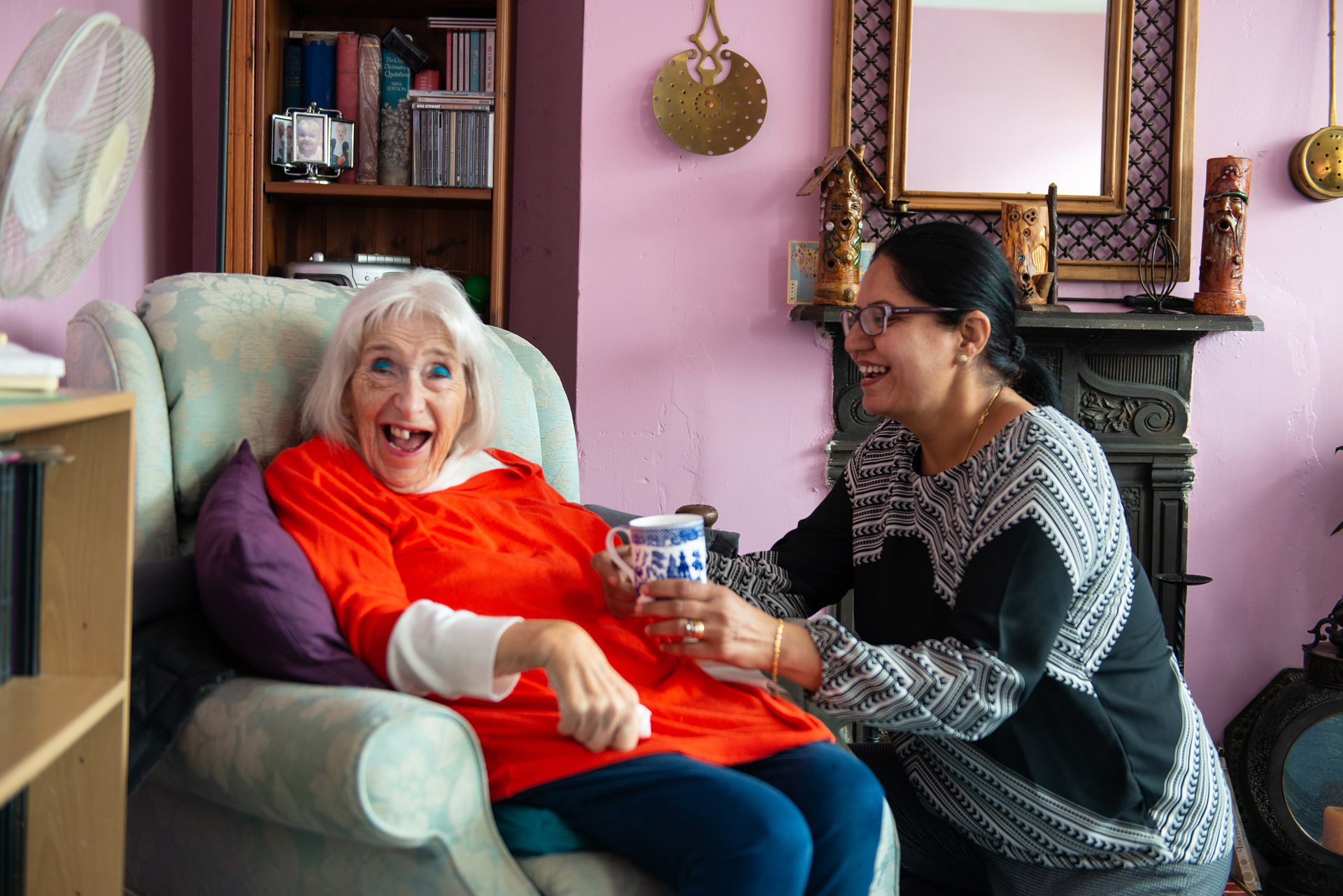 Client and CareGiver talking and smiling 