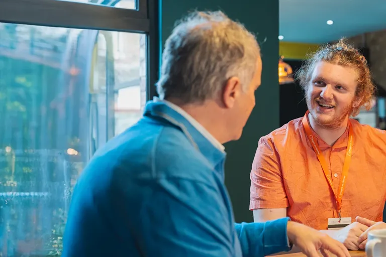 Client and Carer enjoying an afternoon cup of tea following a morning trip to the supermarket