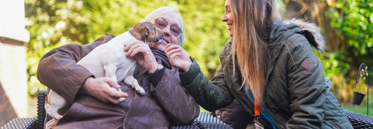 CareGiver-with-Client-and-dog