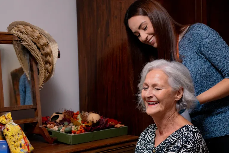 Carer providing support with cooking a nutritious meal for our Client