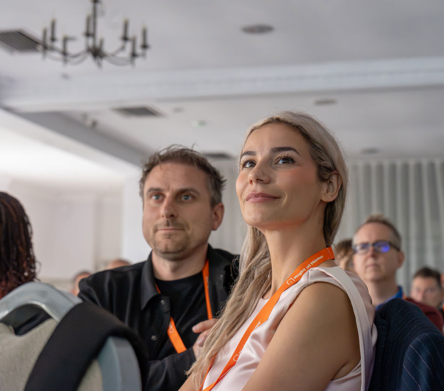 franchise owners watch talks at annual conference