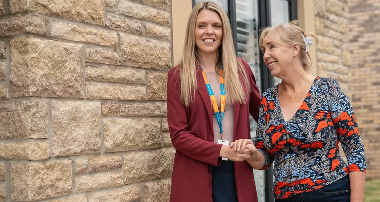 Our Carer visiting a Client for a trip out to the shops