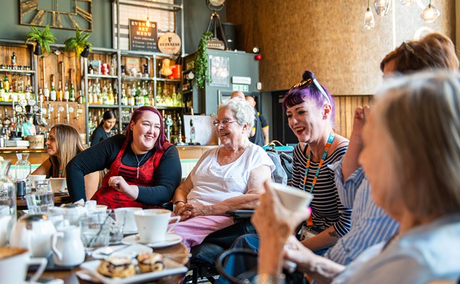 Caregivers and clients in a café