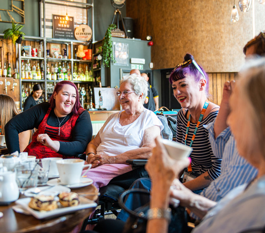 Caregivers and clients in a café
