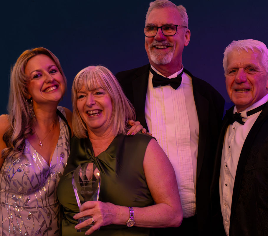 homecare franchise owners and leaders pose for award photograph