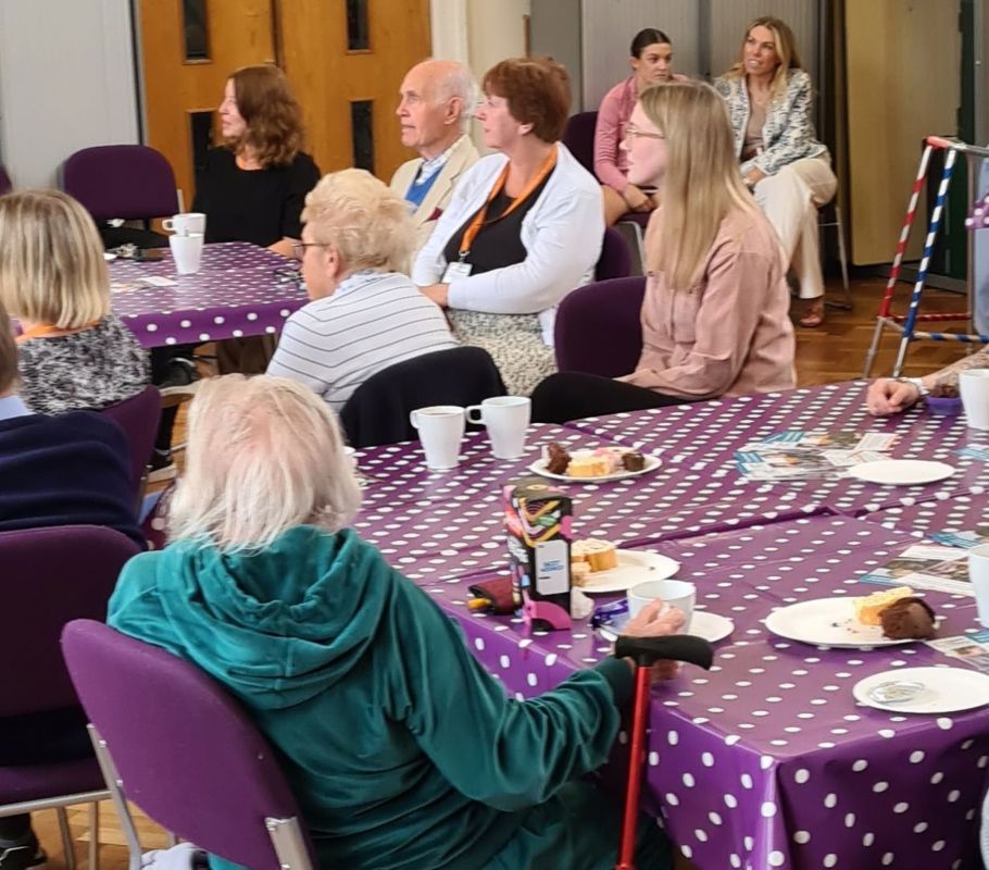 caregivers and clients enjoying community event