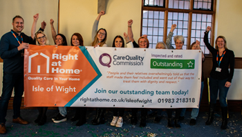 Right at Home Isle of Wight team celebrating their Outstanding rating
