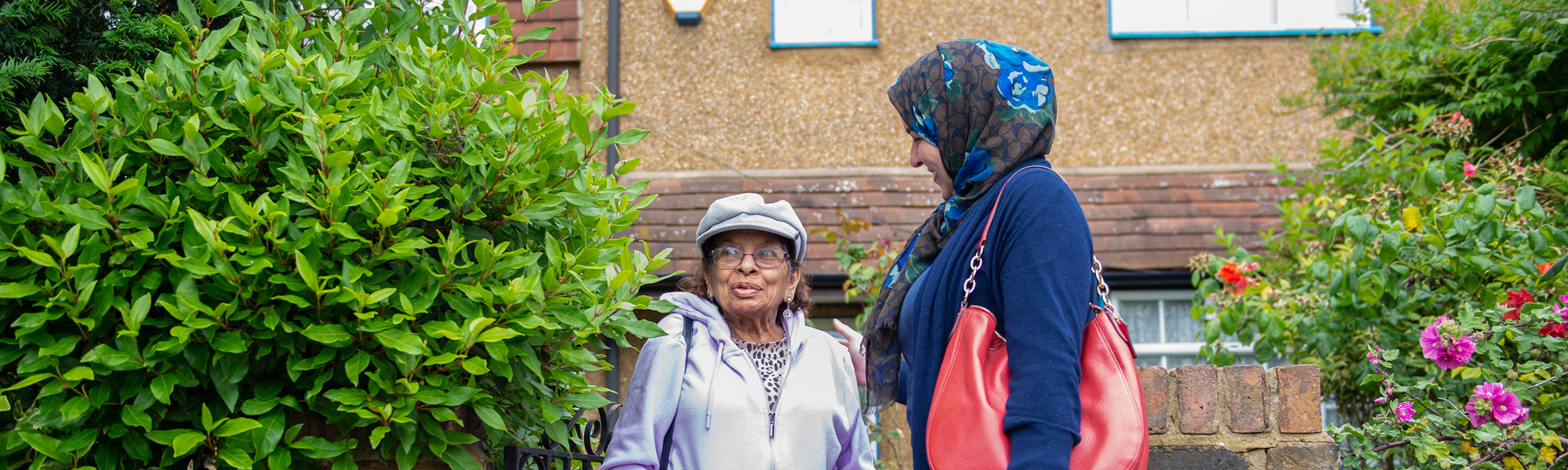 CareGiver with client going for a walk